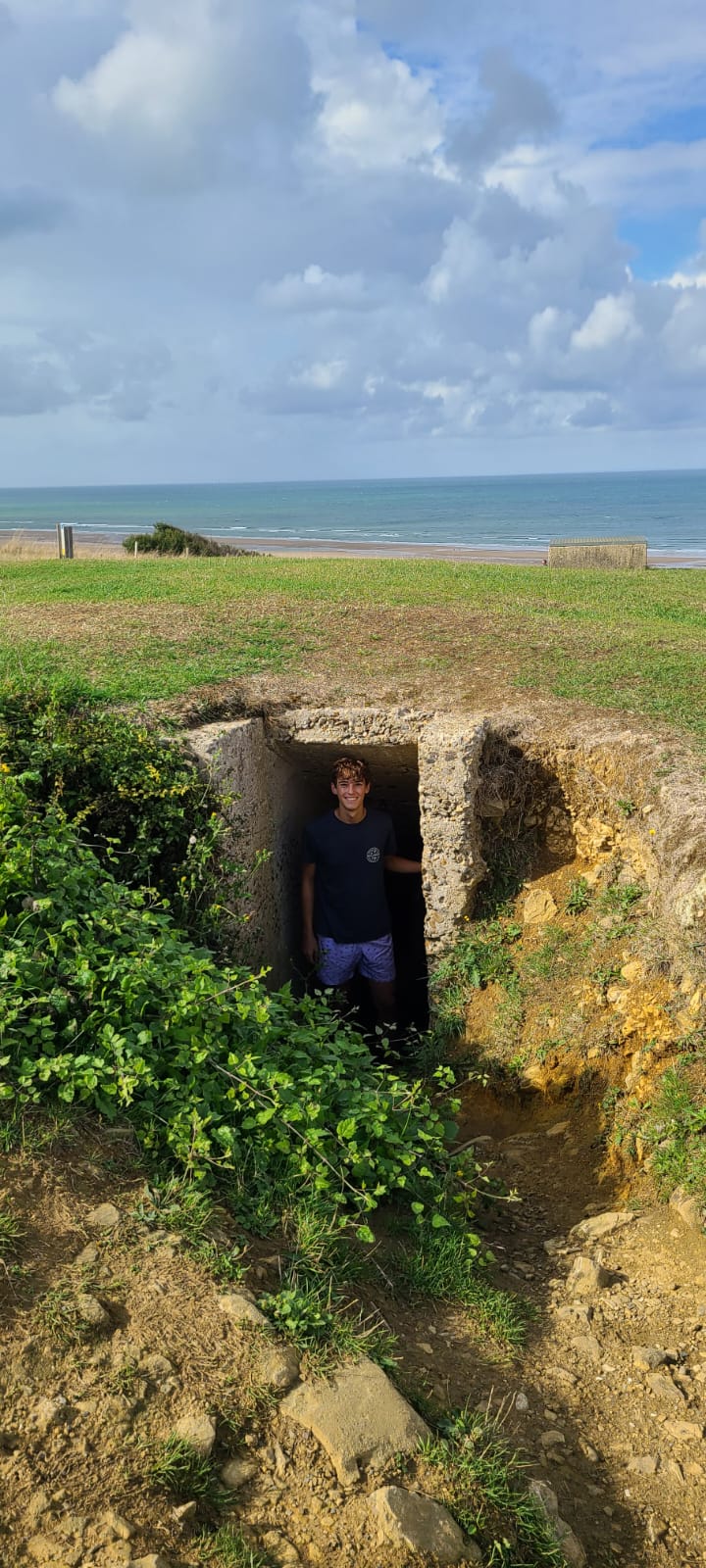 Photo standing in Normandy bunker